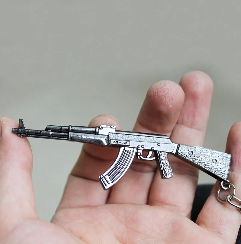 

High simulation Counter Strike AK47 Guns 9.5cm rifle Keychain CS Sniper Key Chain Key Ring Jewelry Souvenirs Gift Men lovers