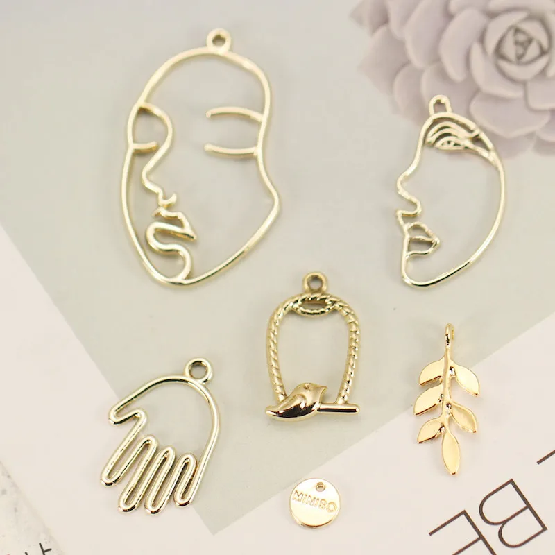 

20PCS Hollow Sexy Women Face Shape bird Charms Golden Silver Alloy pendants DIY Jewelry handmade Findings Earring Accessories