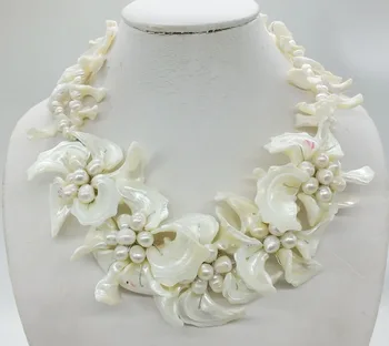 

Classic white shell, pearl, flower necklace