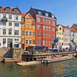 Buildings along a canal with boats  Nyhavn  Copenhagen  Denmark Poster Print (30 x 14)