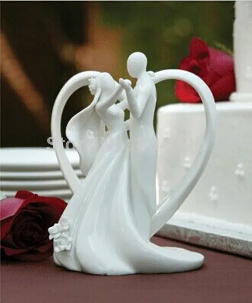 

Romantic Wedding Dancing Bride and Groom Couple With Heart Arch Ceramic Cake Topper Wedding Figurines Party Favor Free Shipping