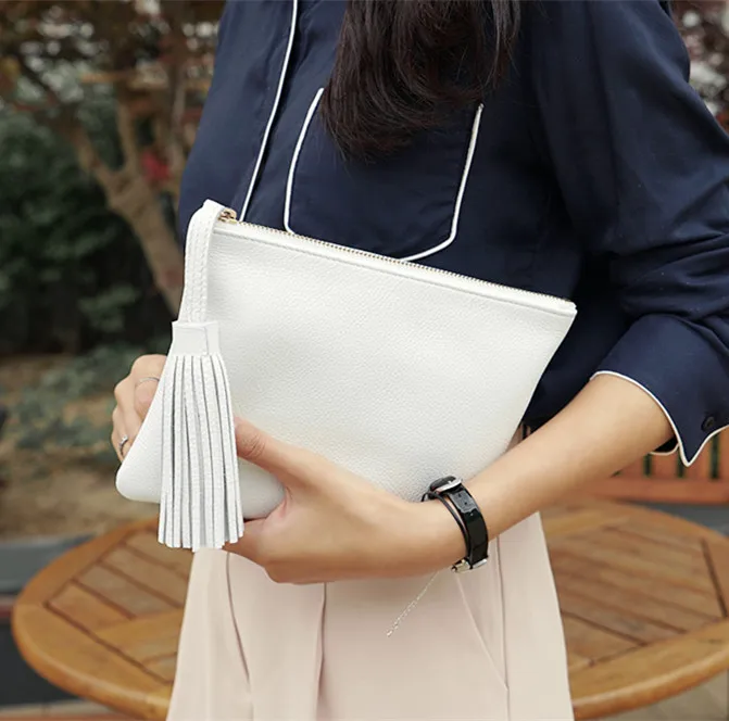 2019 summer new Korean version of the tide ladies tassel bag clutch bag Europe and the United States simple temperament female