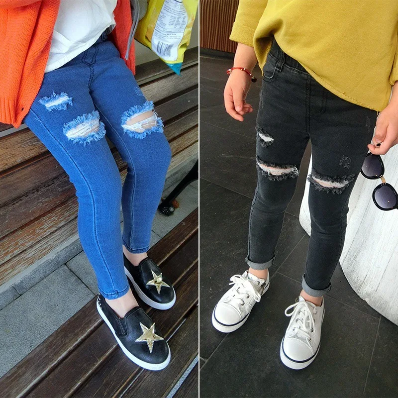 Comprar 2016 nuevos pantalones vaqueros de otoño para niñas y niños de algodón flacos pantalones vaqueros rasgados negros azules para niñas de 2 8 años Vaqueros de moda para niños