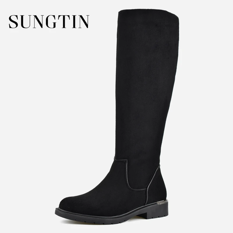 suede boots in snow