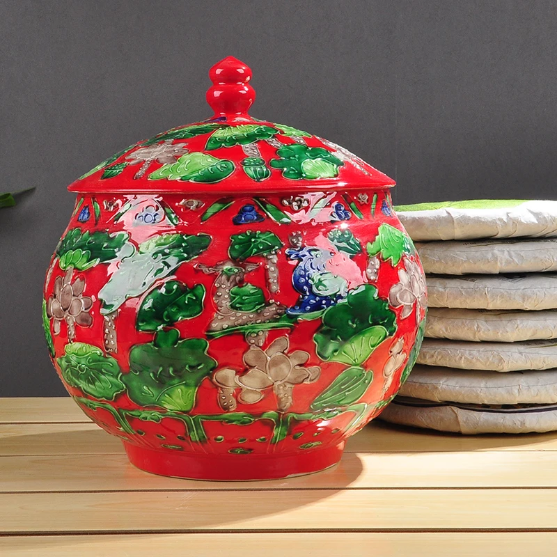 

Chinese ceramic embossed lotus tea pot cake-like bulk tea cans collection storage box kitchen office storage box