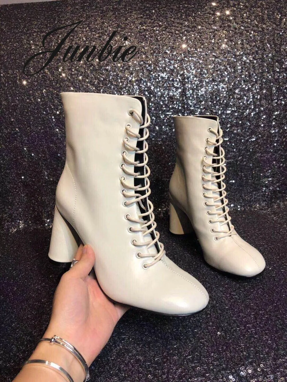 

JUNBIE Top Quality Famous Brand Genuine Leather Gladiator Lace Up Women Boots 8.8 CM Round Heel Women Winter Fashion Boots