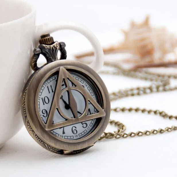 Винтаж Модные кварцевые Дары смерти из Гарри Поттера, выдалбливают бронза женские и мужские карманные часы