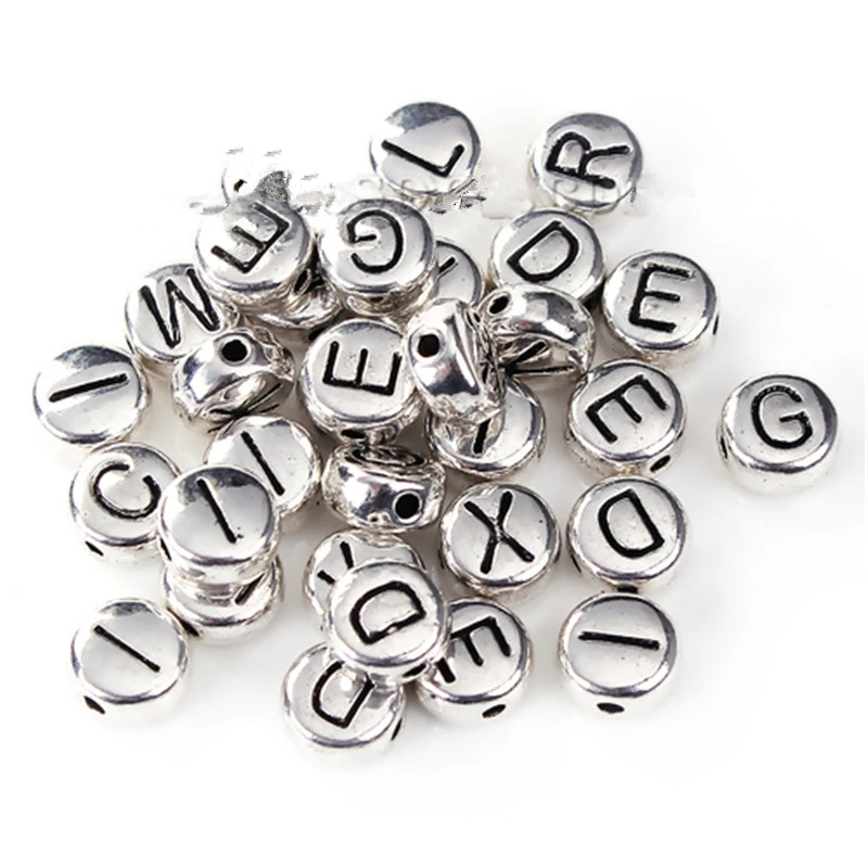 

DoreenBeads Zinc Based Alloy Spacer Beads Round Silver Tone At Random Initial Letter About 6mm Dia, Hole: Approx 0.8mm, 10 PCs