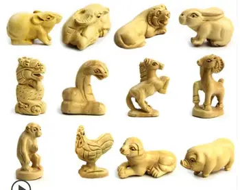 

wooden carving zodiac animal signs in the yellow poplar tree handlebar Tiger rabbit, dragon snake and horse Sheep statue Home