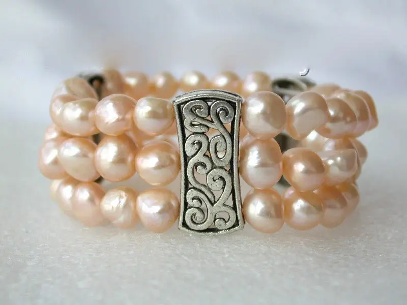 

Free shipping >>>>>>stunning 3rows 9mm pink baroque freshwater cultured pearl bracelet