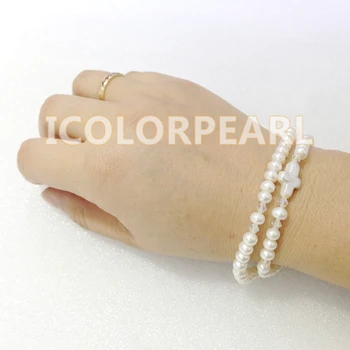 

WEICOLOR Nice Two-Strand Small White Flatround Natural Freshwater Pearl Cross Bracelet on Elastic Wih Crystal Beads