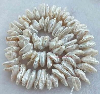 

wb 002872 Natural 10x12-12x18mm White Baroque Fresh Water Pearl Beads 15.5