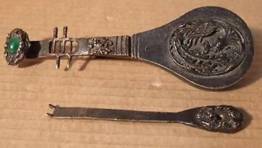 

Rare old style brass carved lute the Phoenix lock and key