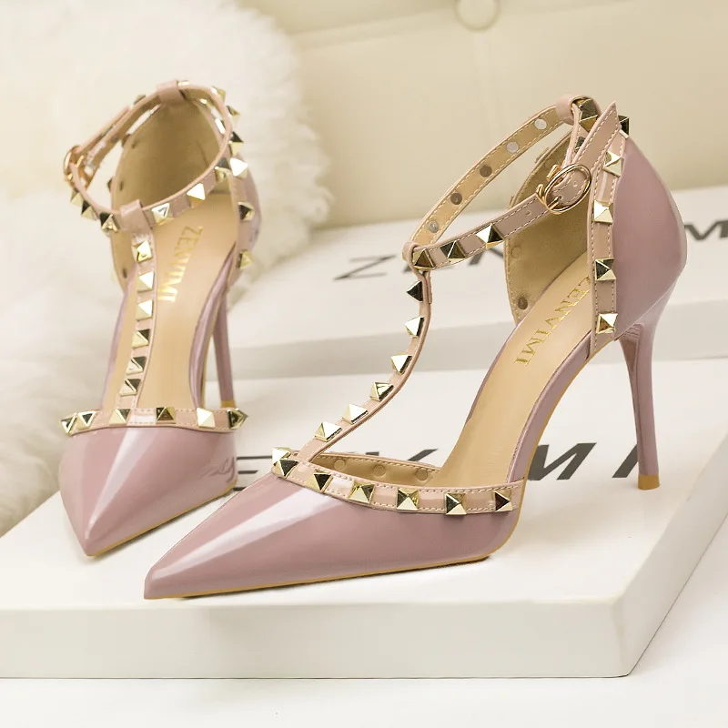 

Europe and America sexy stiletto slimming high heels shallow mouth pointed rivets hollowed out with women's shoes