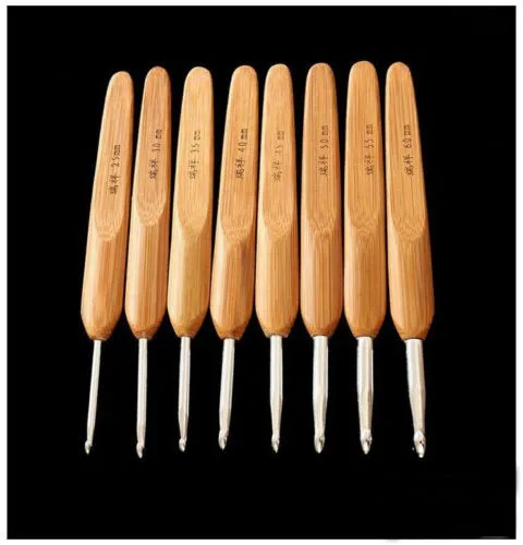 Новинка, высокое качество, 7 шт., 7 размеров, металлические Алюминиевые крючки для вязания крючком с бамбуковой ручкой, инструменты для вязания, набор игл 3,0-6,0 мм
