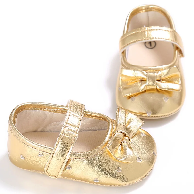 gold newborn shoes