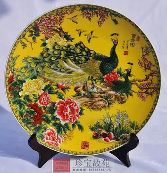 

Collection of antique porcelain of Jingdezhen porcelain plate ornaments rich yellow peacock figure send display