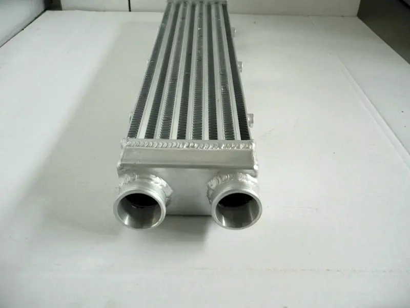 

NEW for Aluminum Intercooler 550x140x70 mm 2.2" Inlet outlet Delta Fin Design One Sided