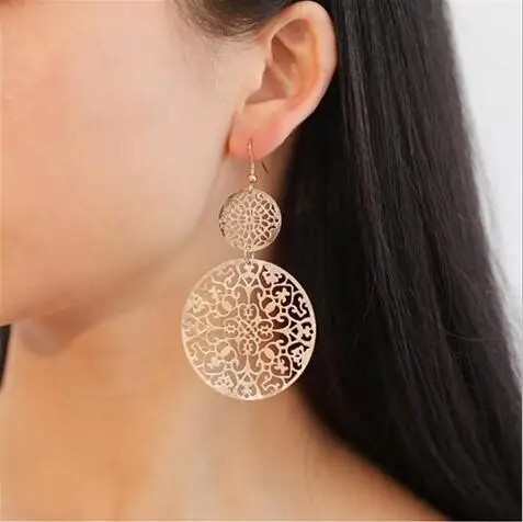 

e 1138 Retro hollow disc frosted earrings court national wind carved earrings hot European and American fashion earrings factor
