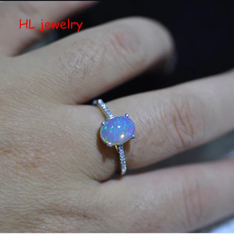 

Natural Fire Opal 7x9mm Oval 925 Sterling Silver Lady Rings