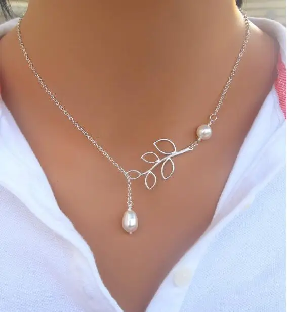 

x 464 Europe and the United States style personality leaf pearl drop cross necklace clavicle chain factory direct sales