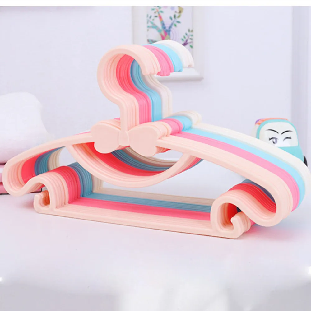 

10 pcs lot Small Size Colorful Plastic Infant Clothes Hanger Multifunctional Kids Clothing Hanger Save Wardrobe Space