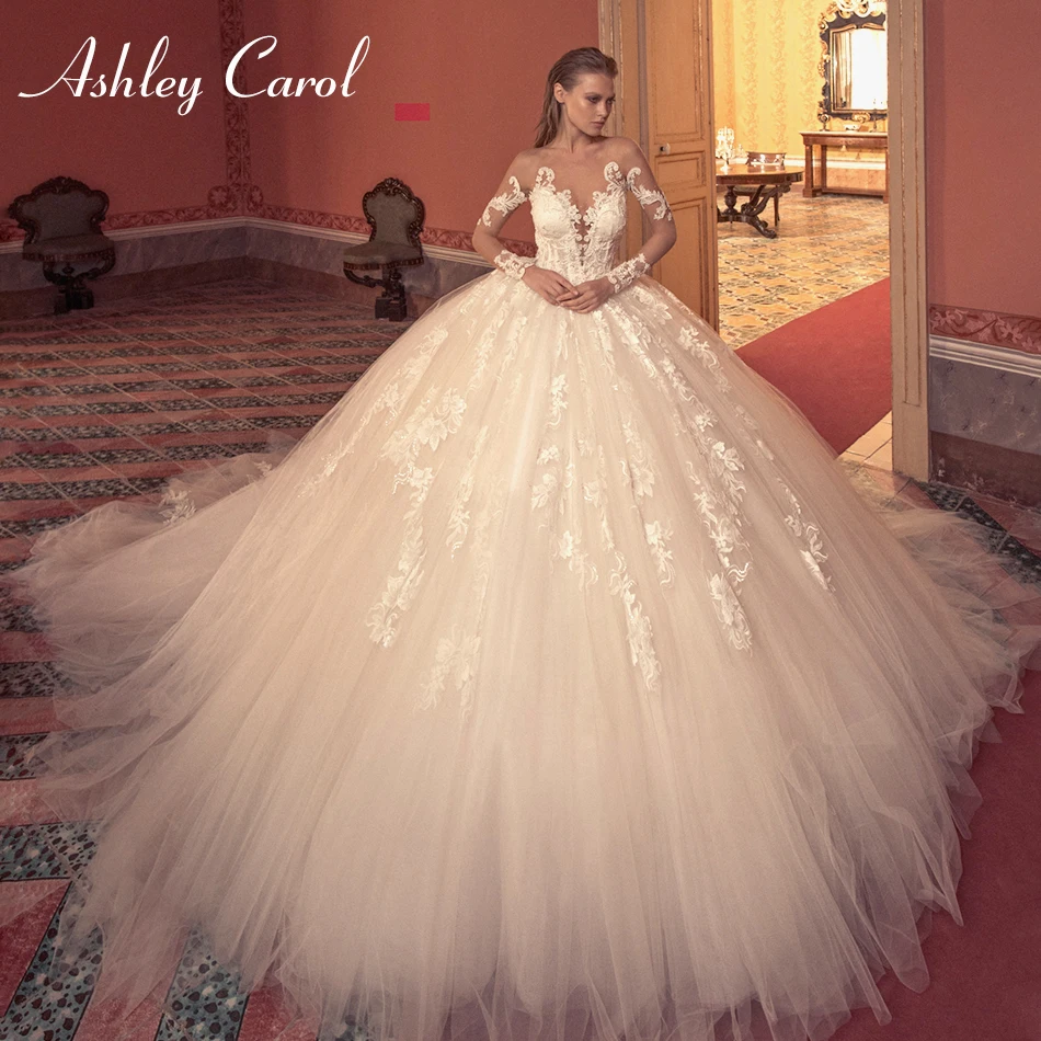 

Ashley Carol Luxury Beaded Long Sleeve Illusion Back Wedding Dress 2019 Sexy V-neckline Cathedral Train Princess Wedding Gowns