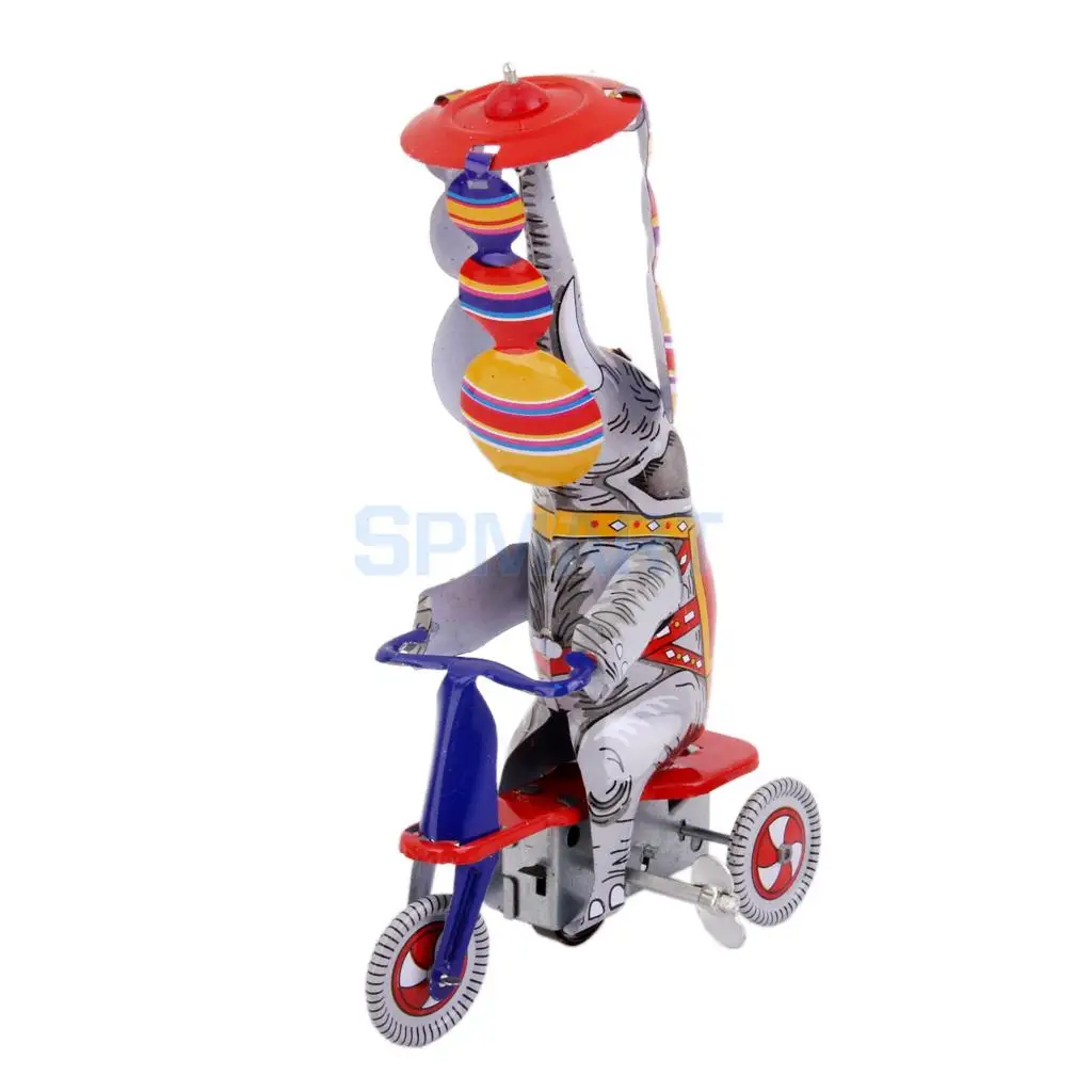 Заводной цирк слон нос на трехколесном велосипеде заводная игрушка коллекционная