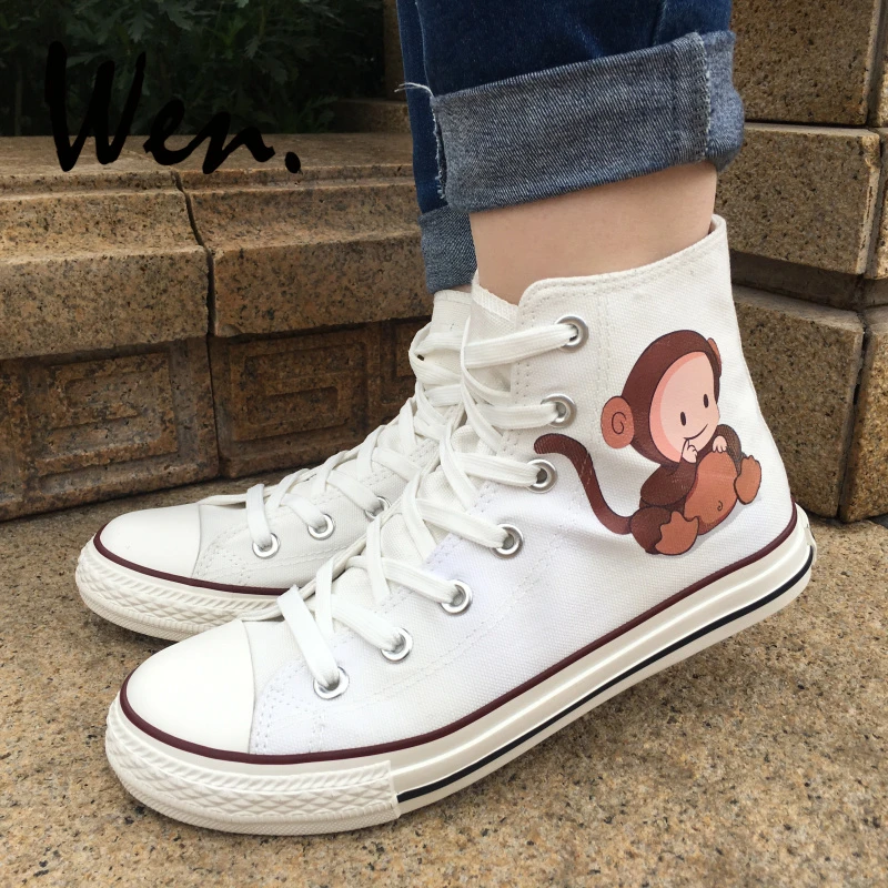 white canvas baby shoes