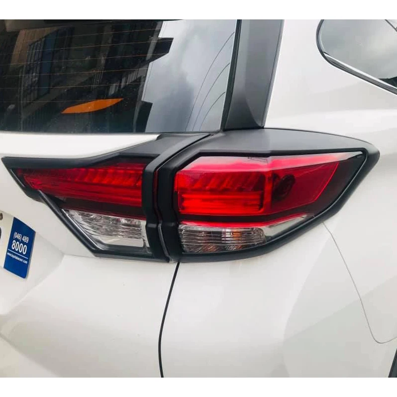 

The new For Rush 2018 2019 ABS Rear Light Lamp Cover Trim Tail Light Cover Frame Protector Sticker Car Styling Accessory 4pcs