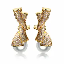 Elegante Joyería de Nueva pendientes con simulado perla pavimenta el ajuste con placa de Rodio aaa cubic zirconia pendiente de declaración
