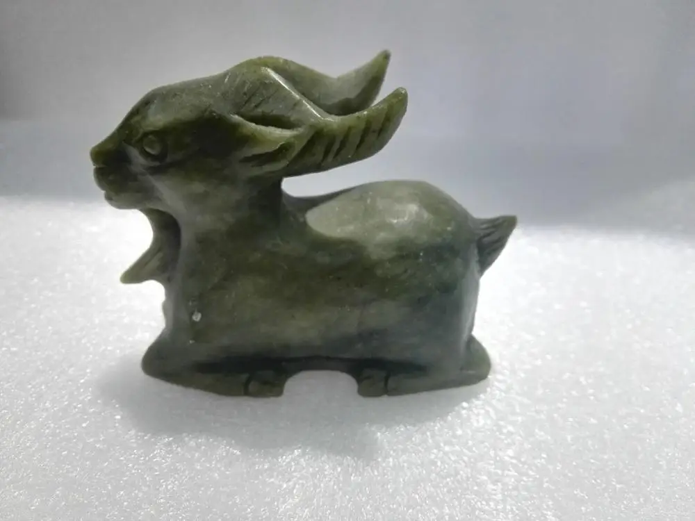 

Handmade carved natural Xiuyu sheep ornaments