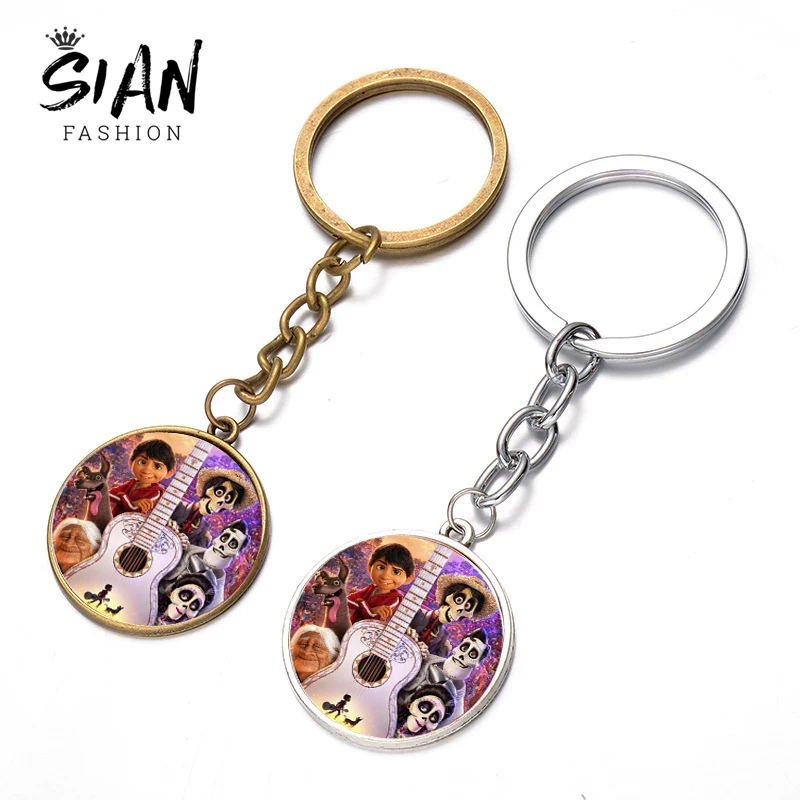 

SIAN Hot Pixar Movie Coco Keychain Collection Miguel Family Anime Figures Glass Cabochon Toy Key Chain Holder Chaveiro Kids Gift