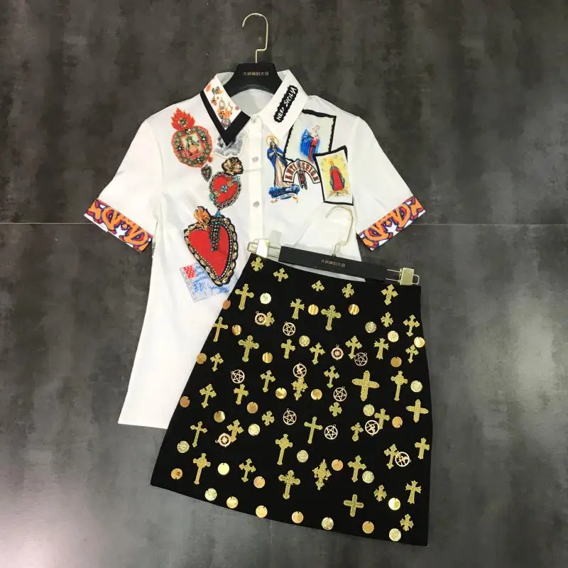 

2019 summer and autumn new retro European and American style beaded embroidery shirt + cross-stitch short skirt two-piece suit