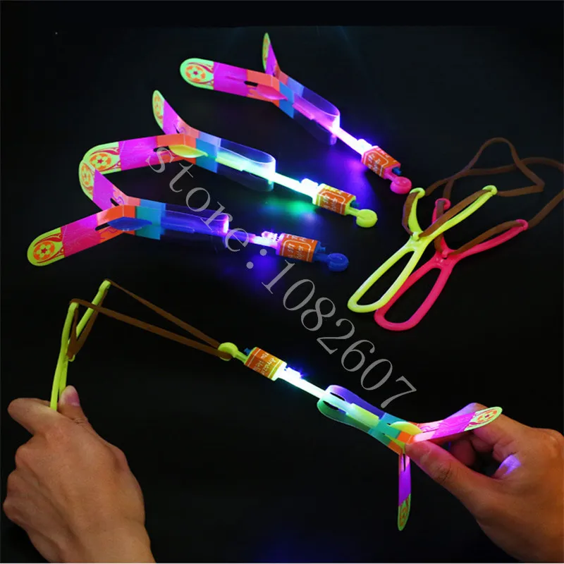 Amazing-LED-Light-Arrow-Rocket-Helicopter-Rotating-Flying-Toys-Party-Fun-Kids-Outdoor-Flashing-Toy-Fly (2)_