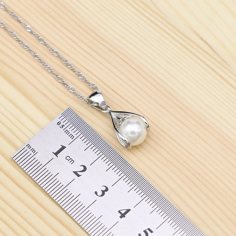 Online Perla blanca 925 conjunto de joyas de plata para mujer boda fiesta decoración gota pendientes anillo colgante Collar conjunto