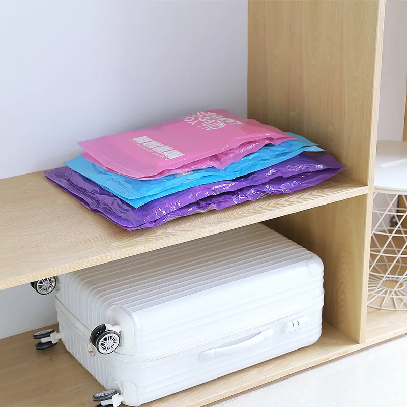 الملابس ضغط تخزين أكياس اليد المتداول الملابس PA + PE فراغ التعبئة أكياس السفر الفضاء التوقف أكياس للأمتعة المنظم