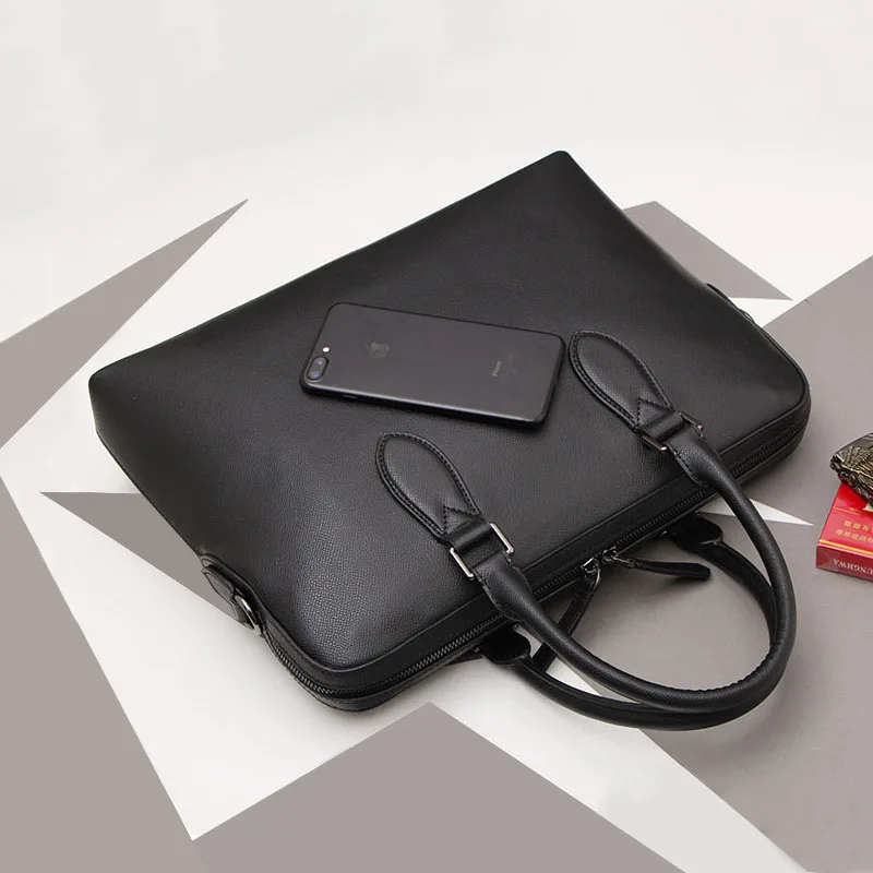 

Men's Genuine Leather Handbag Cowhide Business Shoulder Bag Casual Briefcase.