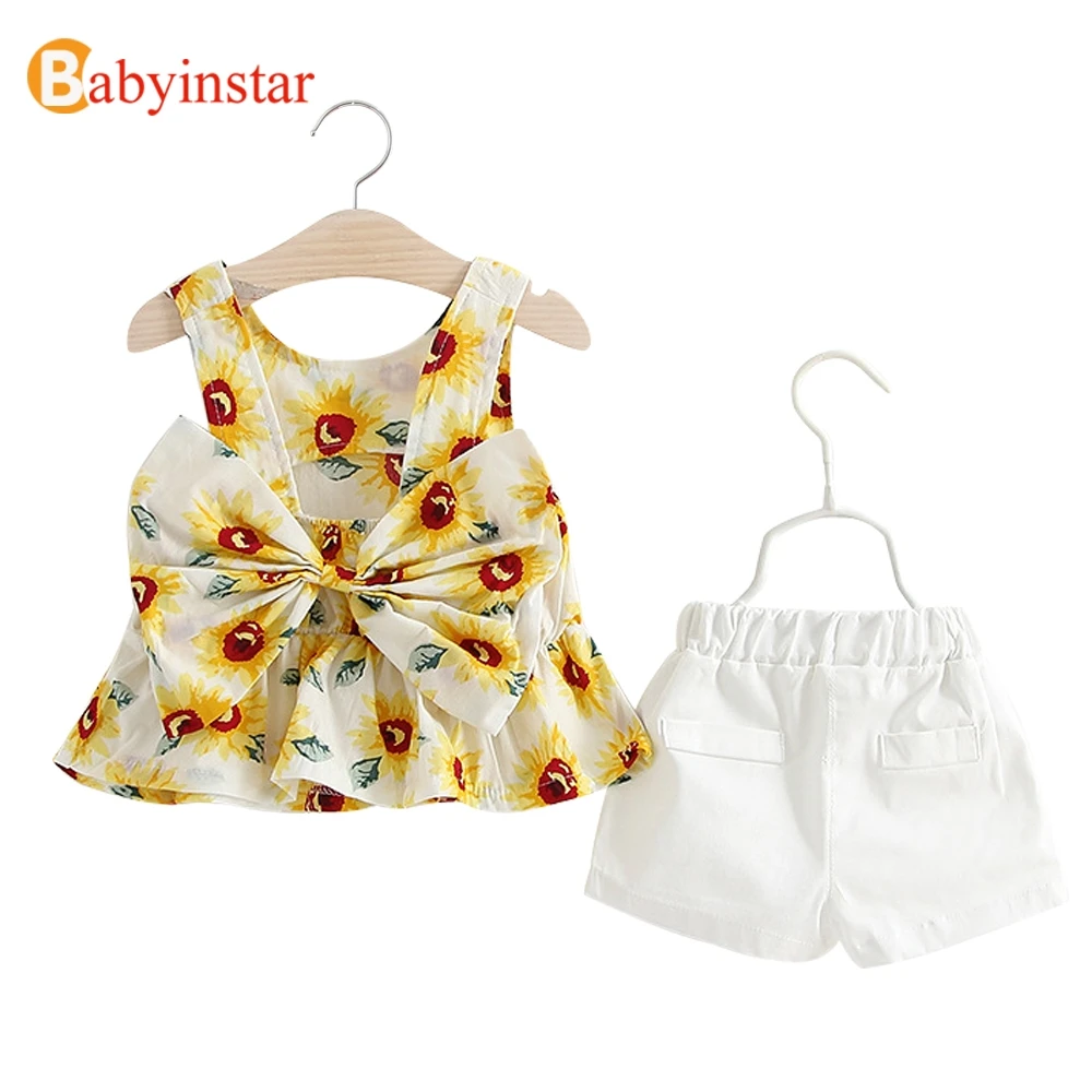 

Babyinstar 2017 New Summer Children Set Girls 2 piece set with Bow Flower Cotton Vest +White Shorts for 1-4Y Costume