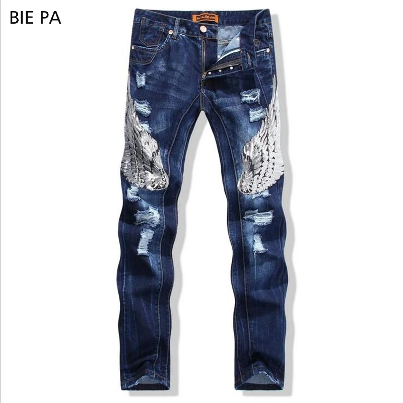 brand men jeans blue ripped and eagle wings of embroidery Movie stars ...