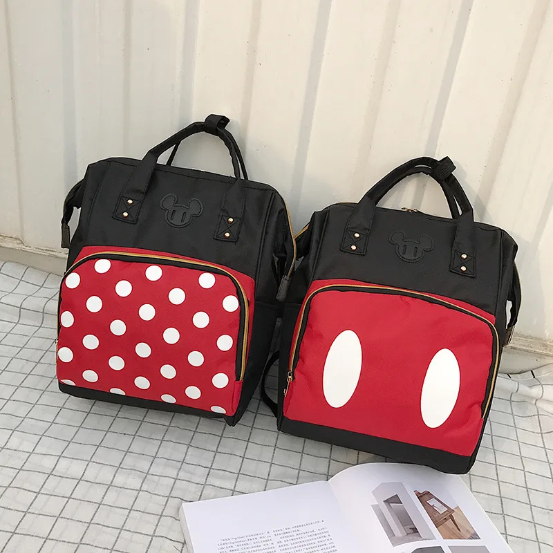 

2019 new Disney Mickey backpack couple canvas shoulder bag large capacity Mummy bag student bag