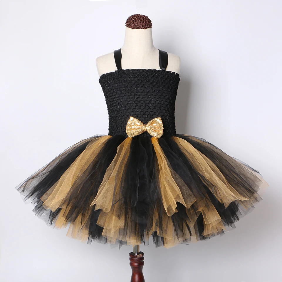 black and gold lol doll