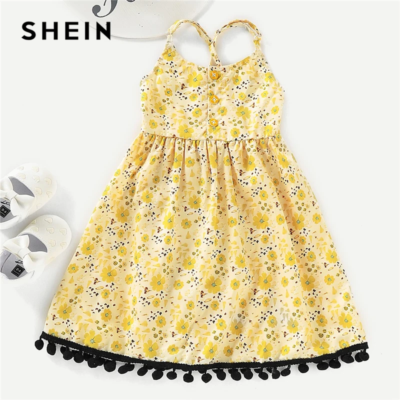 SHEIN Kiddie Yellow Floral Print Pom Pom Girls Cute Spaghetti Strap Dress 2019 Summer Sleeveless Button High Waist A Line Dress SHEIN Kiddie Yellow Floral Print Pom Pom Girls Cute Spaghetti Strap Dress 2019 Summer Sleeveless Button High Waist A Line Dress