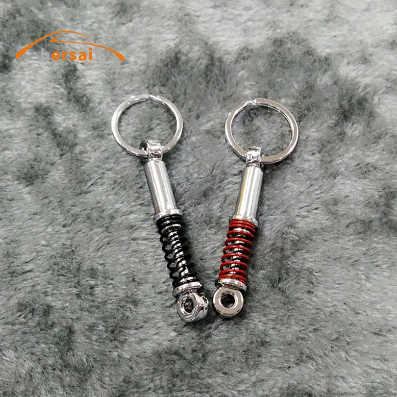

BERSAI Upscale Luxury Metal Shock absorber keychain key ring Car styling Car keyring car key chain Creative Accessories Trinkets