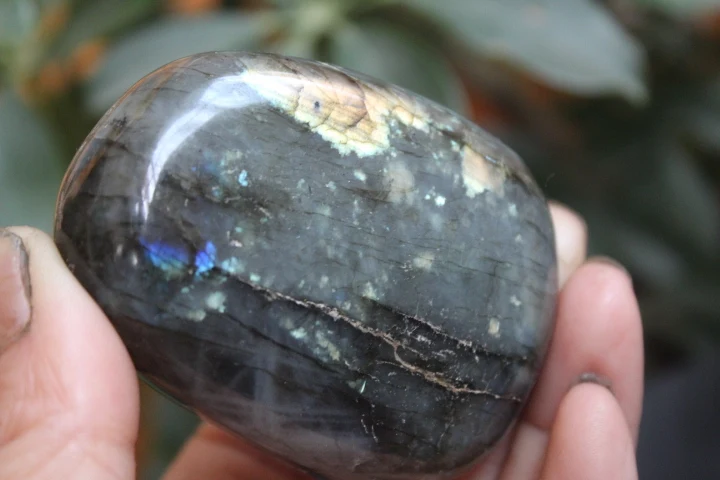 

natural labradorite quartz crystal Hands plaything