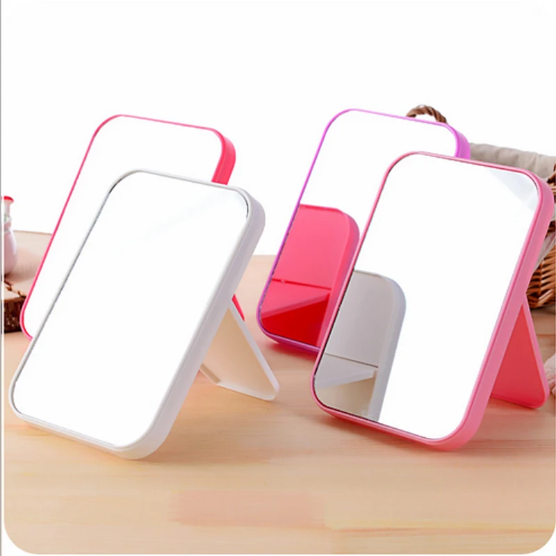 

Simple Design Portable Triangle Shape Women Facial Makeup Mirror Compact Foldable Desktop Cosmetic Makeup Mirror New Cheap