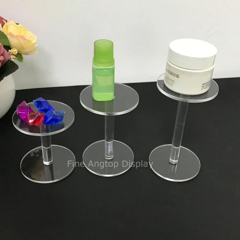 

Set of three round acrylic cosmetic display jewelry stand holder small tea cup display props toy shelf