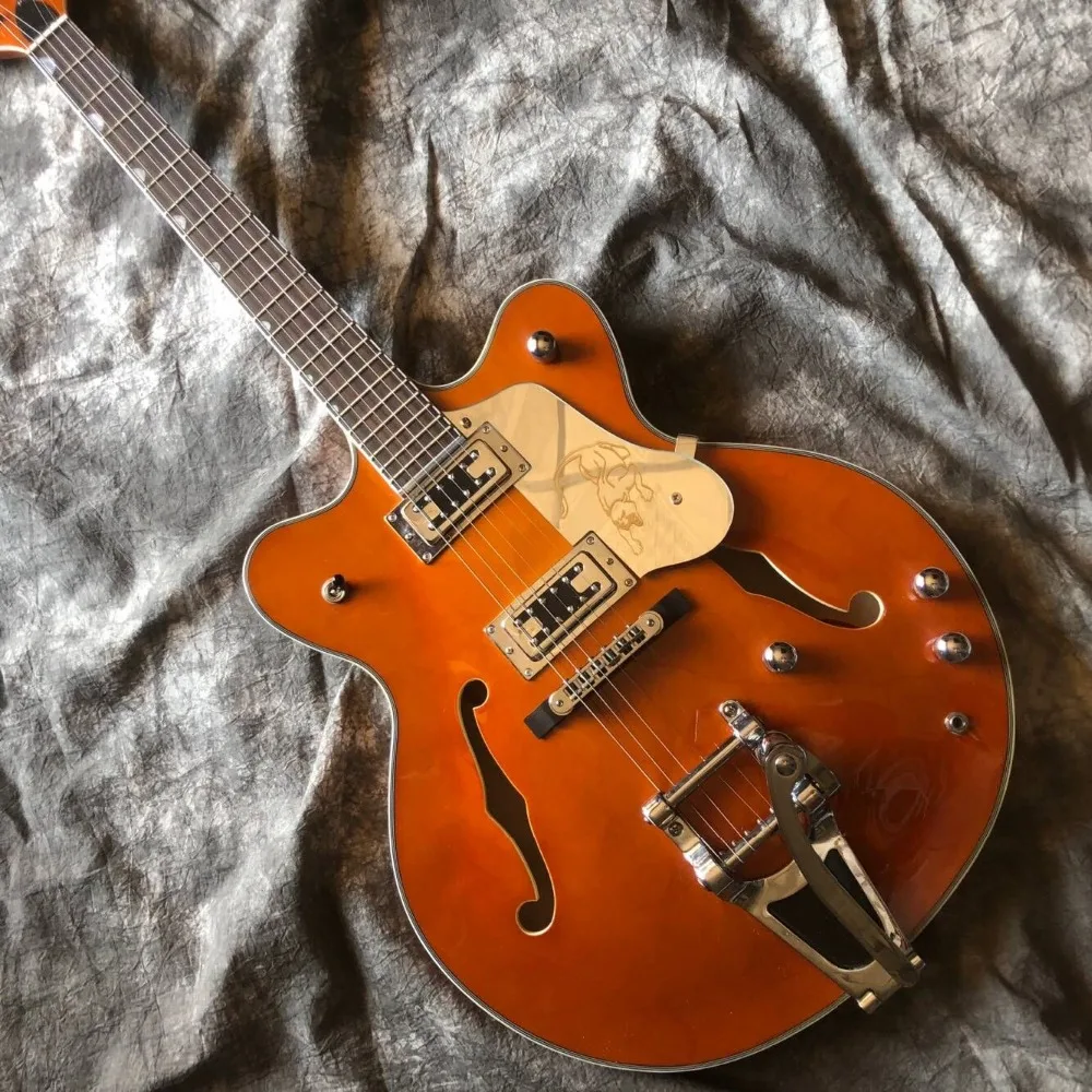

Custom double F hollow body Jazz electric guitar,Rosewood fingerboard, Gold hardware gitaar,vibrato system.real photos