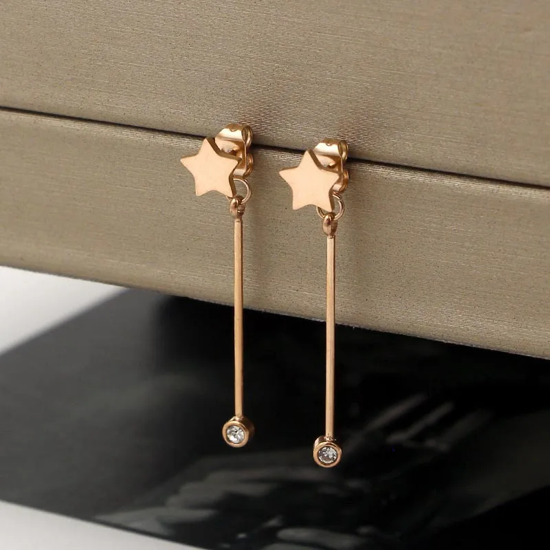 

Fashionable five - pointed rods round bar stone care gold crystal earrings wild earrings titanium steel jewelry