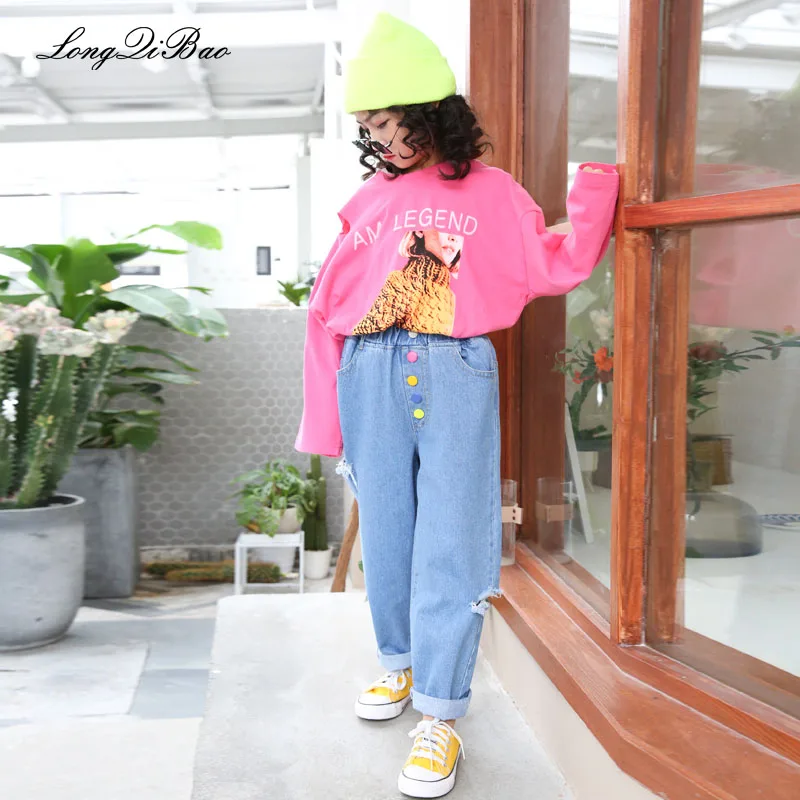 

Girls Korean version of the hole color single-breasted Harlan casual jeans 2019 spring new wave children's clothing